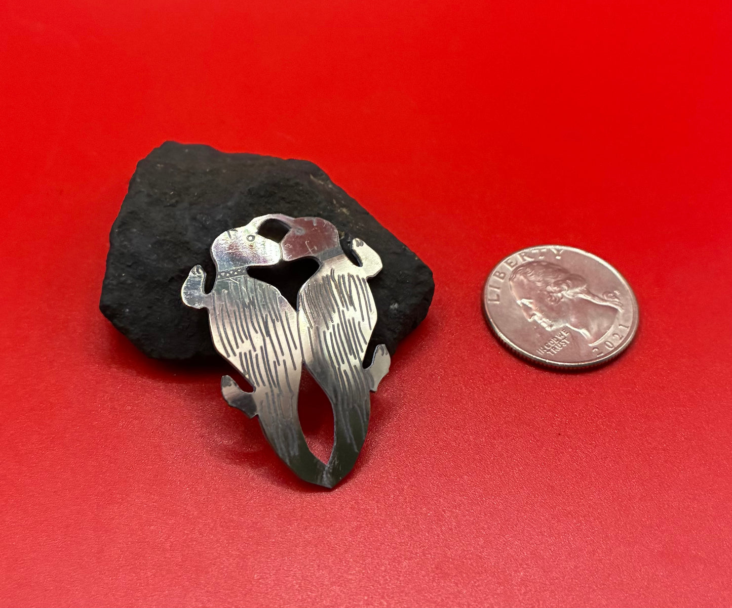 Kissing Otters Effigy